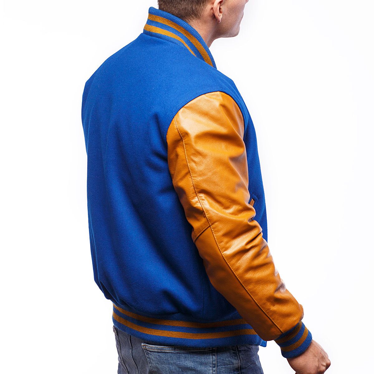 A person wearing a Bright Royal Wool Body & Old Gold Leather Sleeves Letterman Jacket.